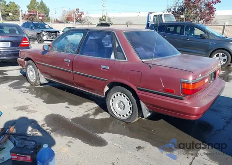 1989 Toyota Camry Le z USA, uszkodzony, nr VIN JT2VV22E6K0065099